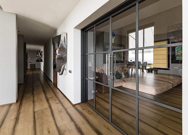 Steel-framed glass partition walls for bedrooms